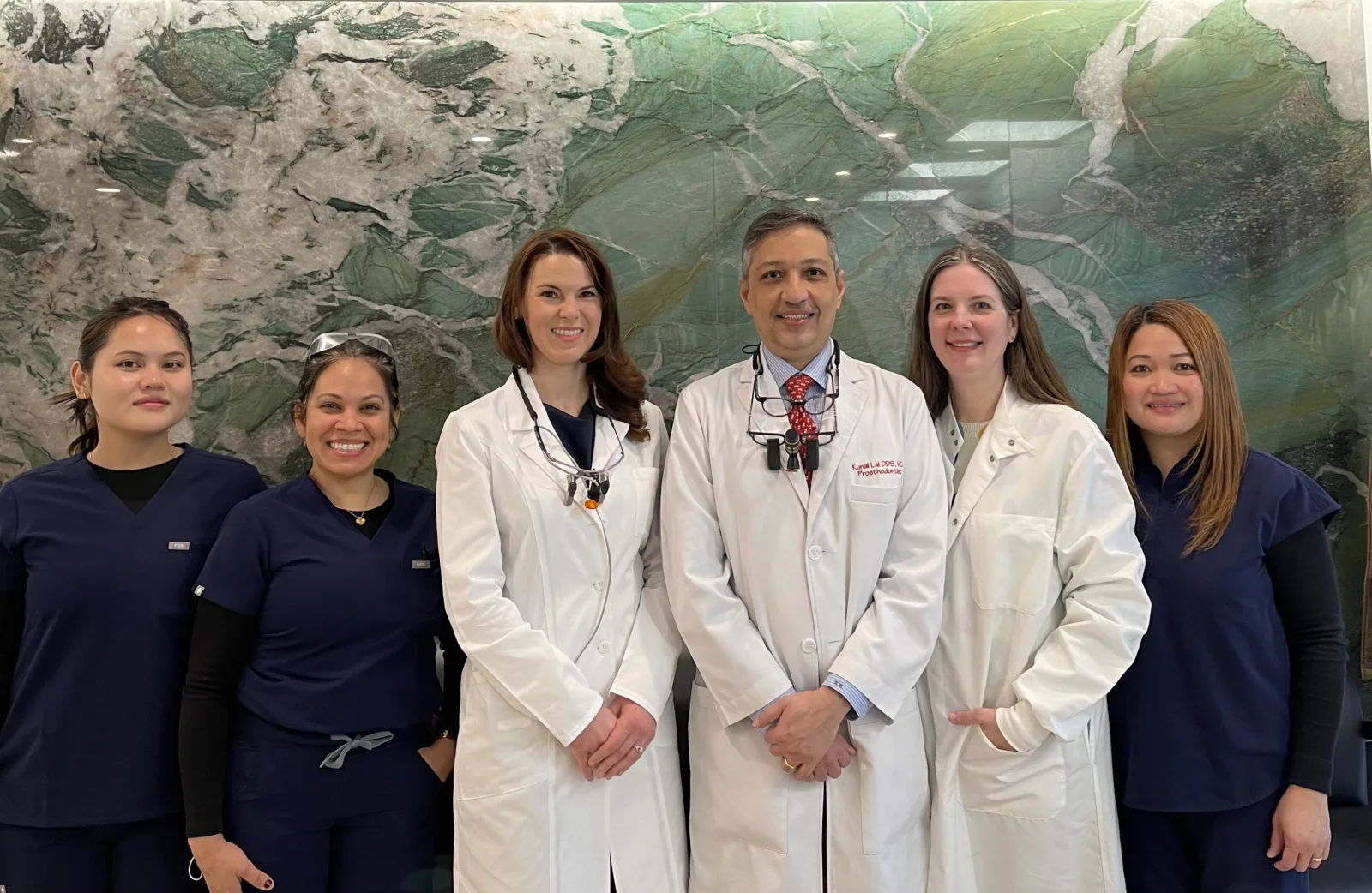 The LAL Dental team, left to right: Sadie, Vianny, Dr. Allison Wisniewski, Dr. Kunal Lal, Ms. Lal and Franny